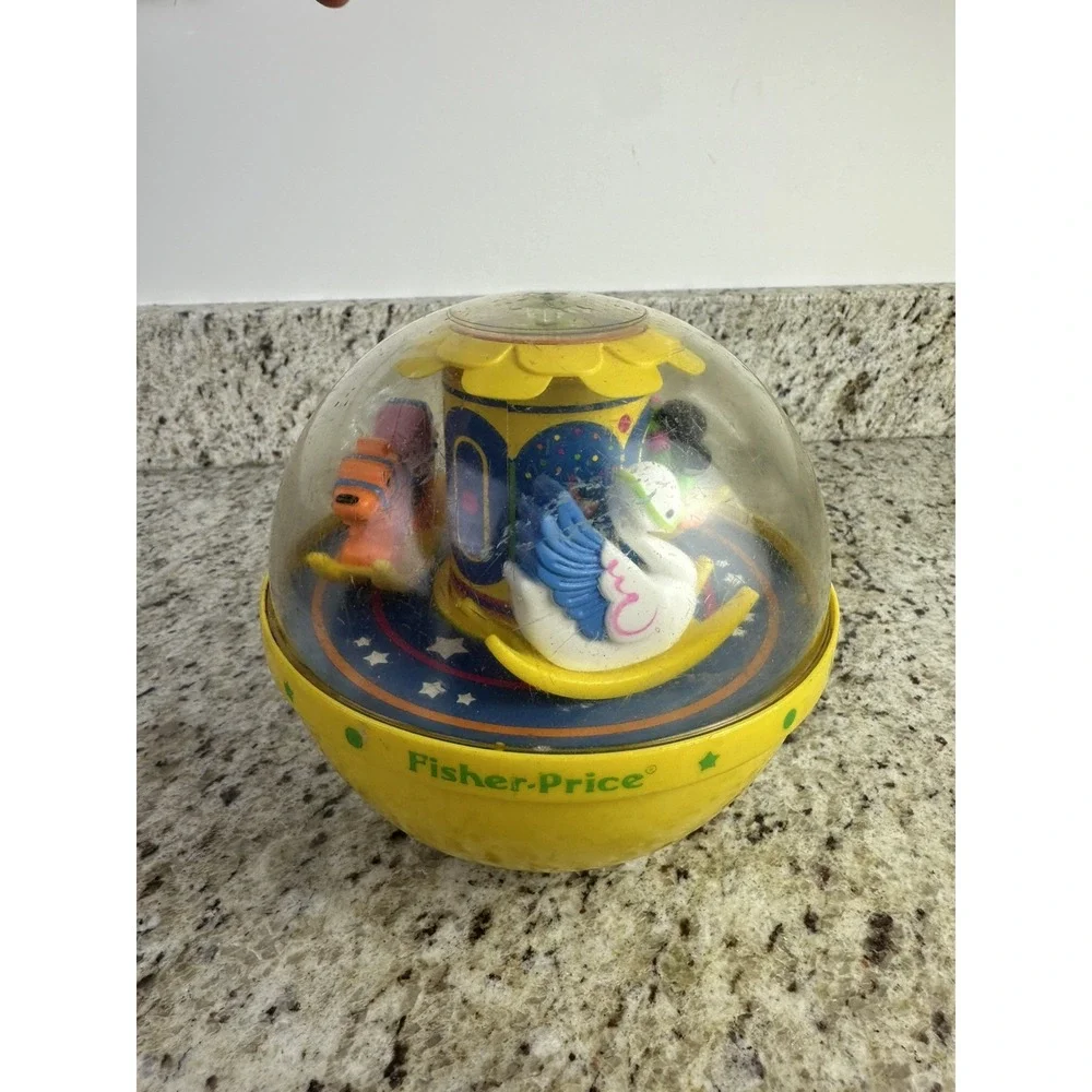 Vintage 1985 Fisher Price Roly Poly Chime Ball Carousel Yellow 1150 nostalgia